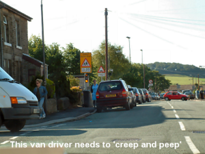 This van driver needs to 'creep and peep' for safety